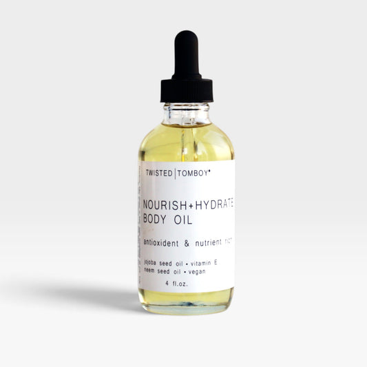 Nourish+Hydrate body oil bottle with dropper