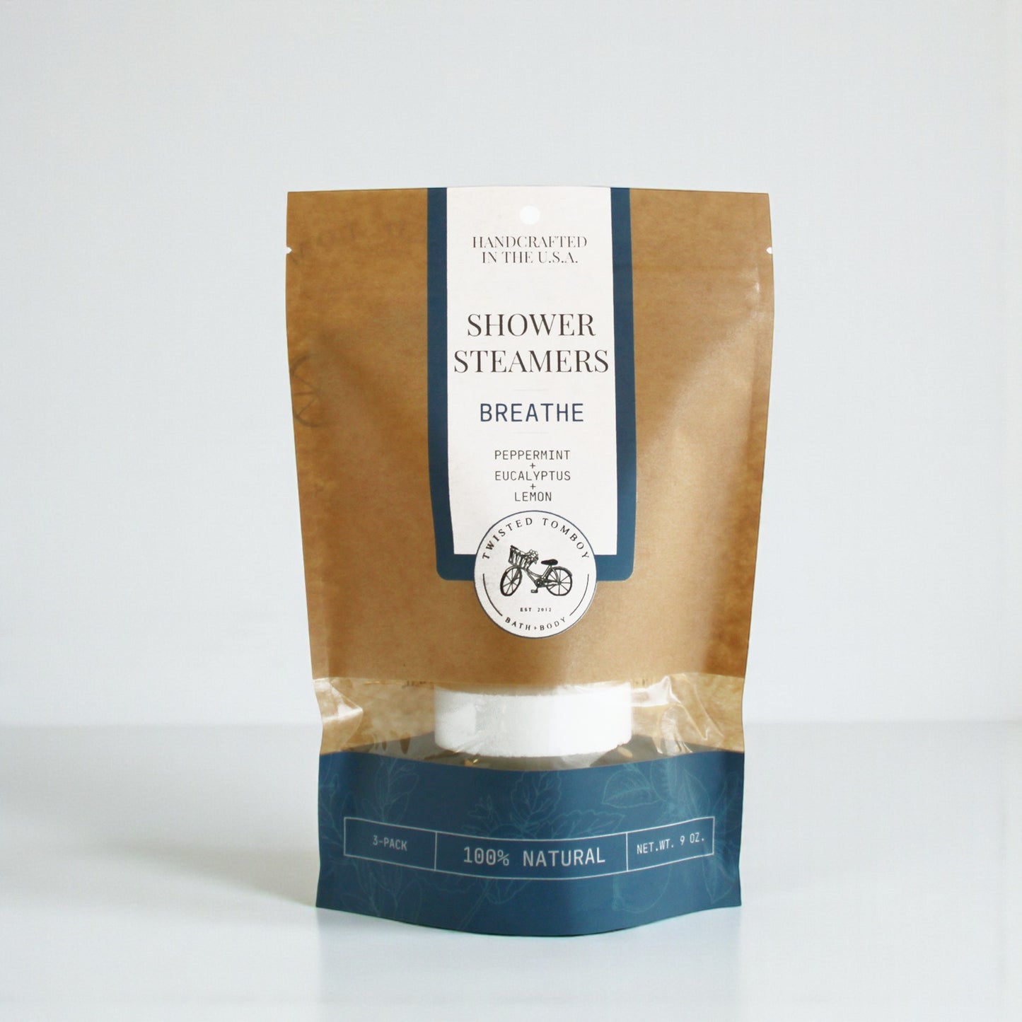 Package of shower steamers labeled 'Breathe' with a brown and white design on a white background.