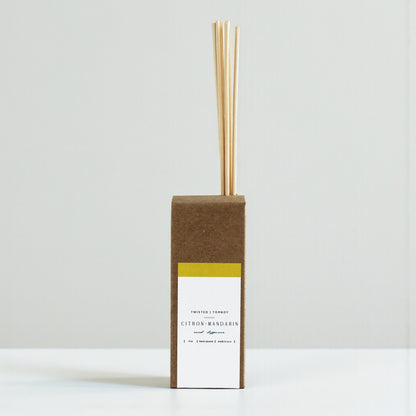 Reed diffusers in six scents, featuring a natural cardboard design and wooden reeds. NEW ARRIVAL!