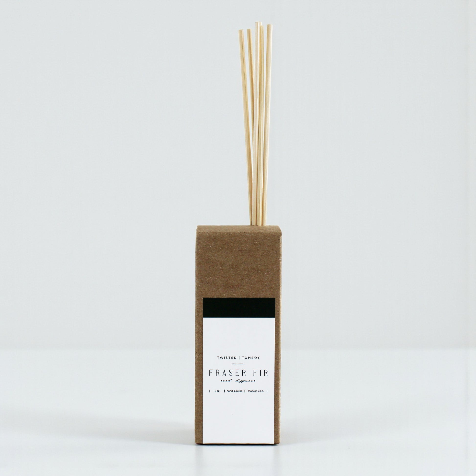 Reed diffuser with Fraser Fir fragrance on a white background