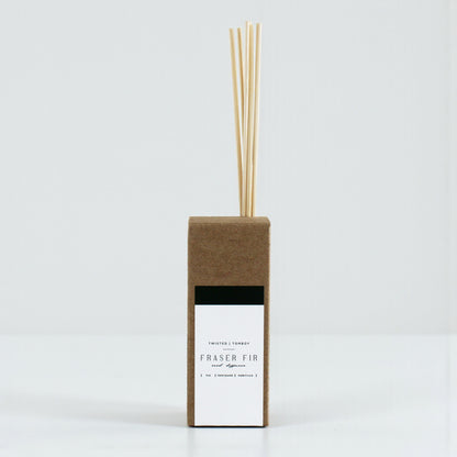 Reed diffuser with Fraser Fir fragrance on a white background