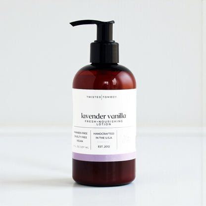 Lavender vanilla lotion bottle with pump on a white background