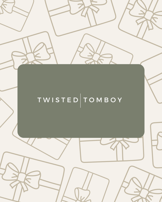 Gift card with 'Twisted Tomboy' logo on a patterned background
