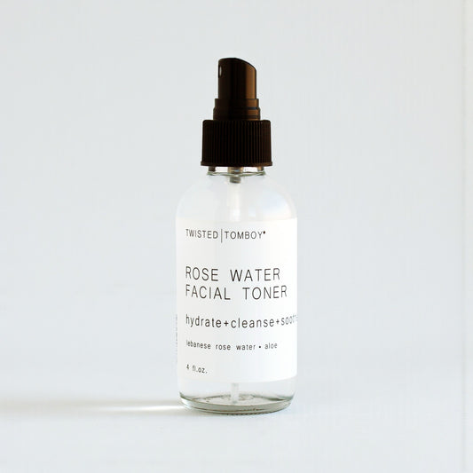 Clear bottle of Twisted Tomboy Rose Water Facial Toner on a white background