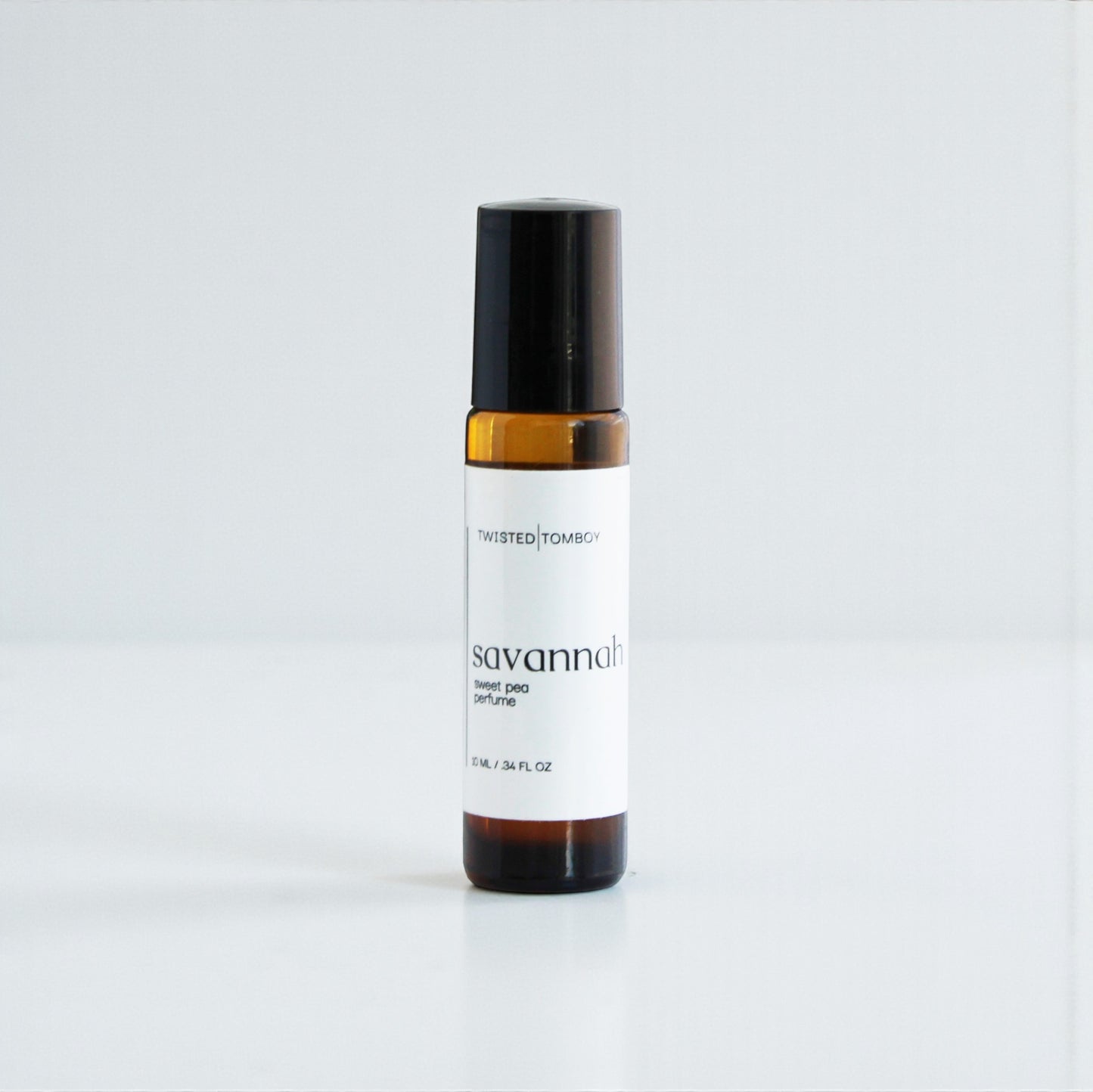 Small bottle of 'Savannah' perfume by Twisted Tomboy on a white background
