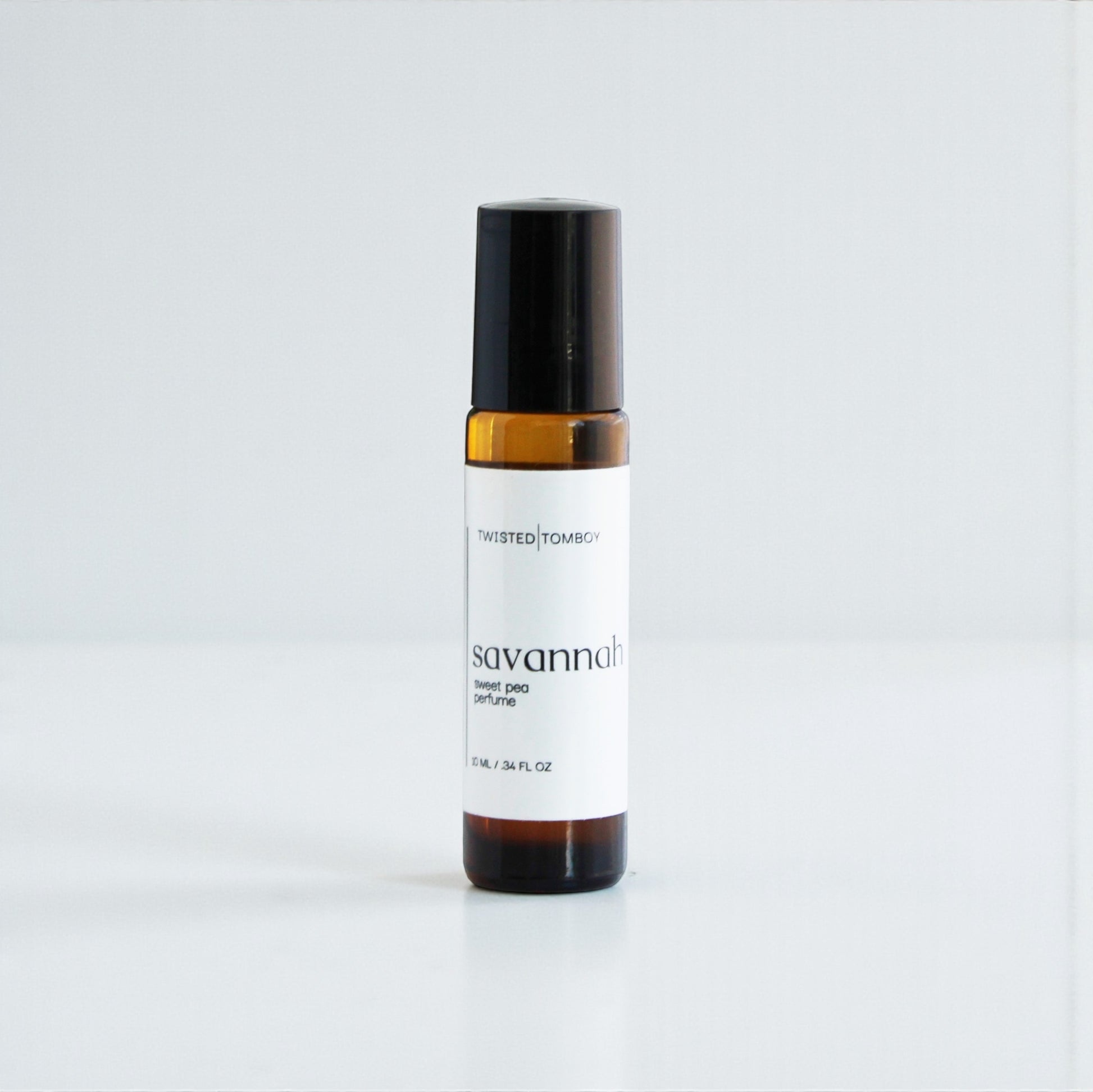 Small bottle of 'Savannah' perfume by Twisted Tomboy on a white background