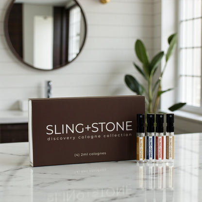 Sling+Stone cologne collection sitting on bathroom counter