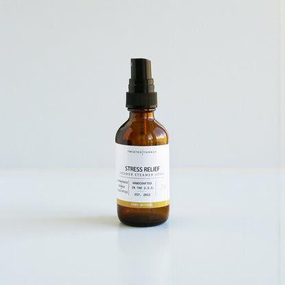 Brown spray bottle labeled 'Stress Relief' on a white background