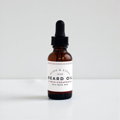 FOR HIM BEARD OIL in amber glass bottle, featuring a citrus and cedarwood scent blend.