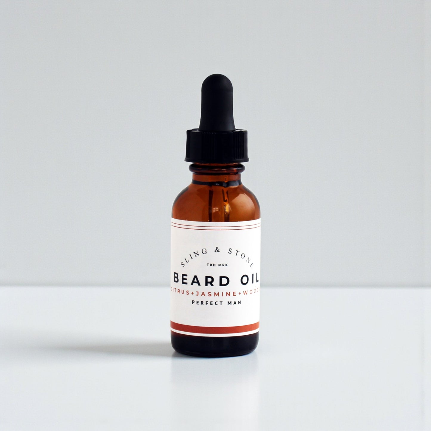 FOR HIM | BEARD OIL | 5-OIL BLEND in amber glass bottle with dropper, featuring citrus, jasmine, and wood scents.