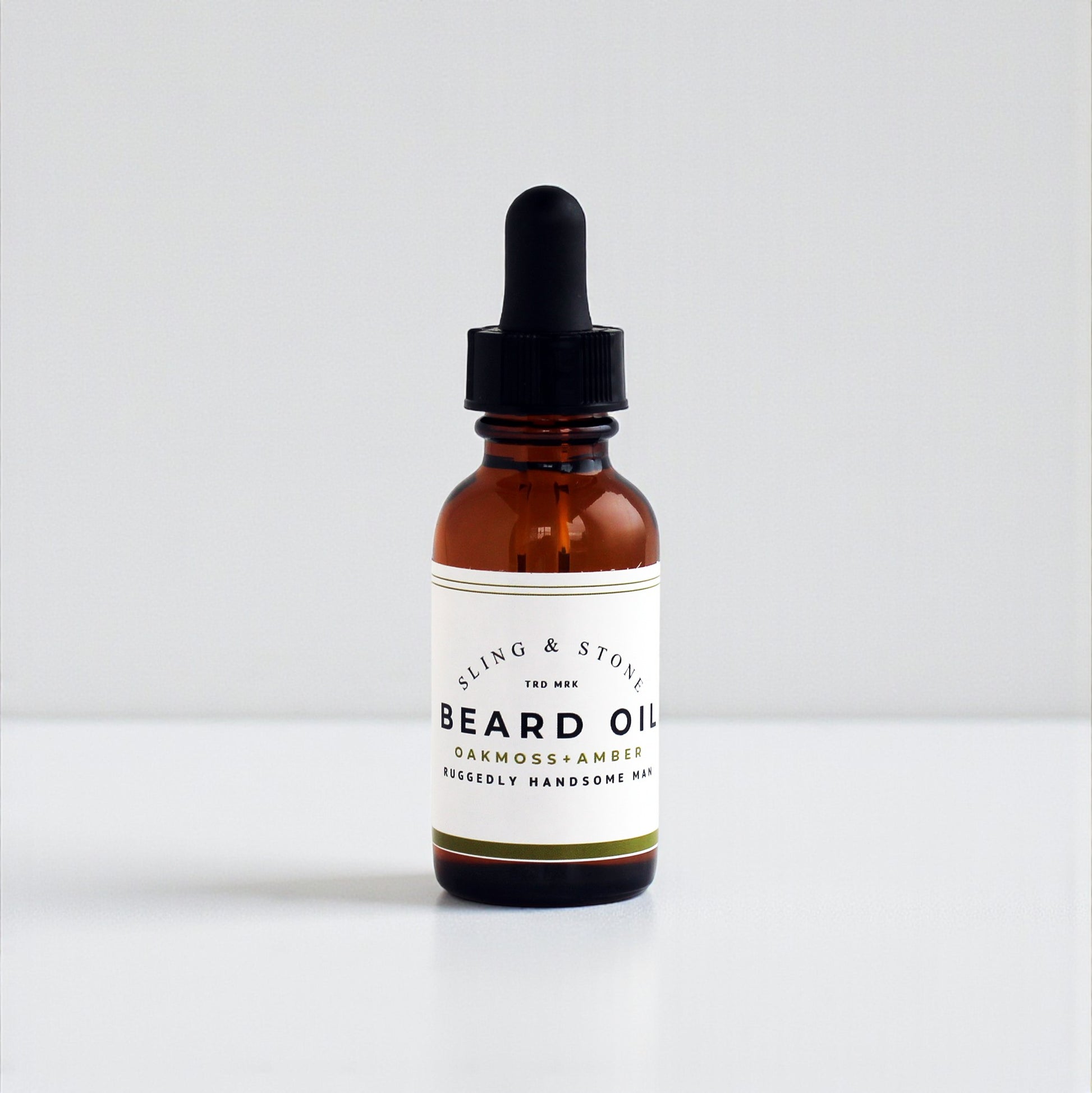 BEARD OIL | 5-oil blend in amber glass bottle with oakmoss and amber scent for a ruggedly handsome mix.