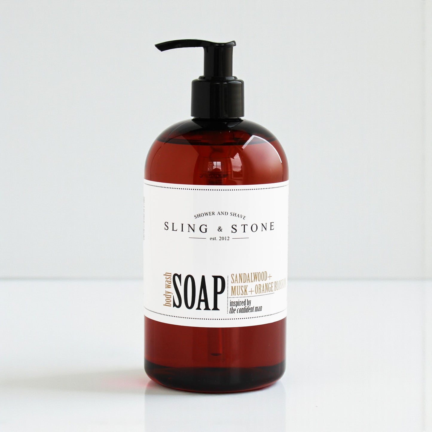 FOR HIM body wash liquid soap in amber bottle with sandalwood and musk scent. Perfect for shower and shave.