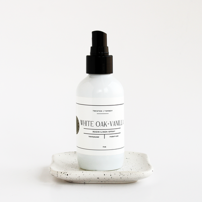 White bottle Fraswer Fir bottle w/black spray nozzle on a white background