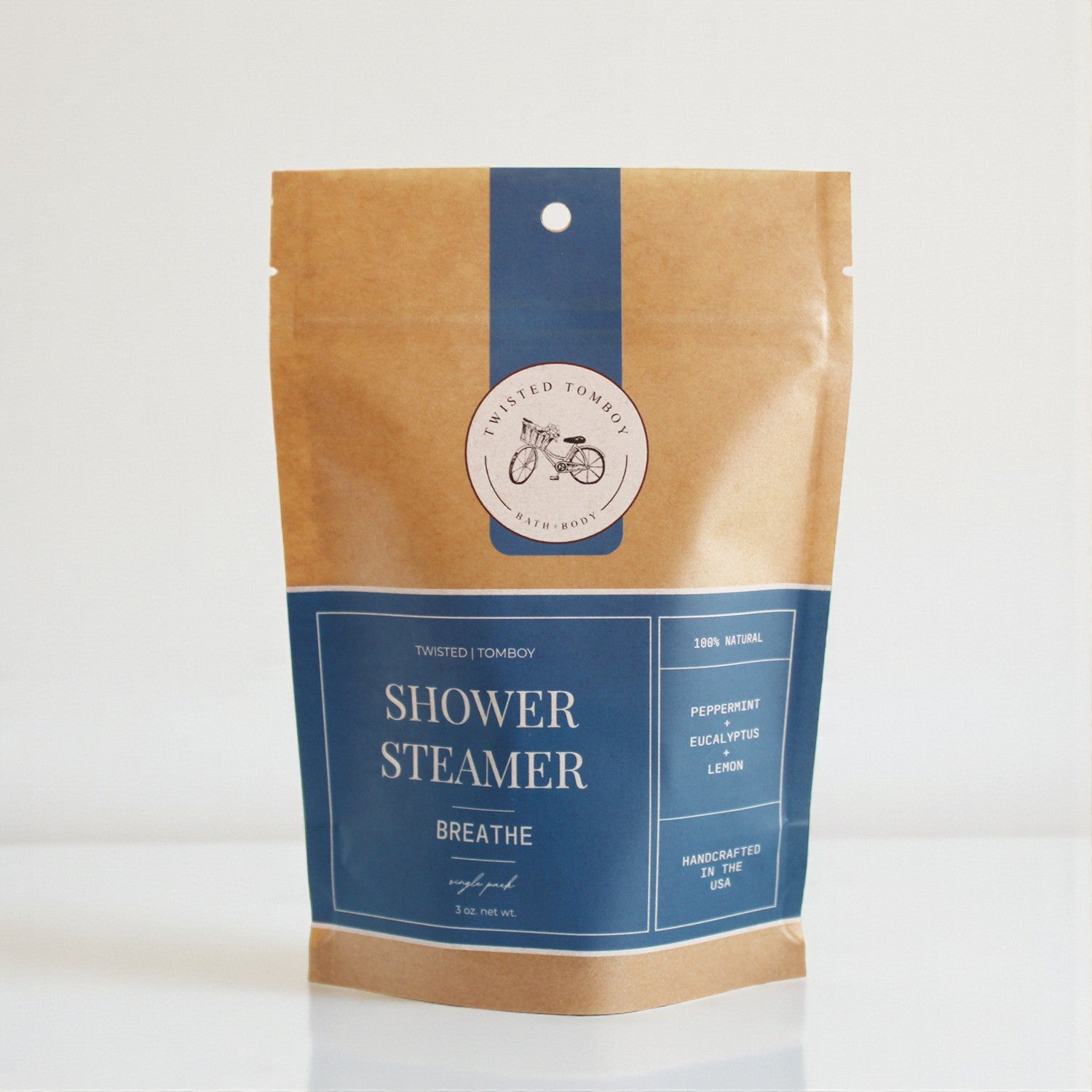Shower Steamer SINGLES in a kraft paper pouch, featuring peppermint, eucalyptus, and lemon scents. NEW ARRIVAL!