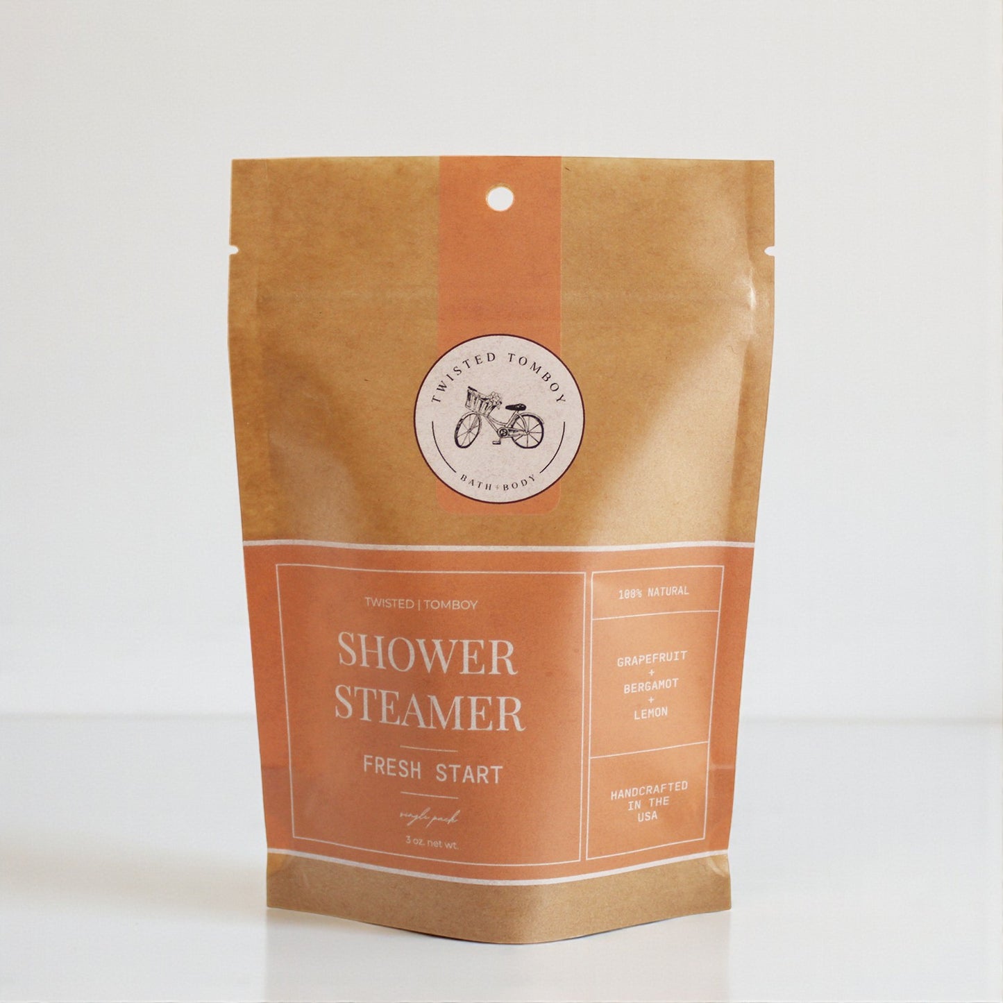 Shower Steamer SINGLES in a kraft paper pouch with a fresh start scent of grapefruit and bergamot. NEW ARRIVAL!