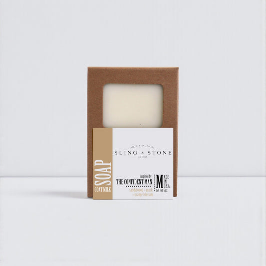 HAND CRAFTED GOAT MILK BAR SOAP in a simple brown box, featuring a label for "The Confident Man.