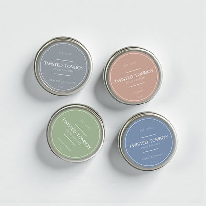 Solid perfume tins in four scents
